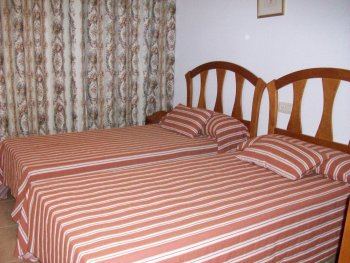 dormitorio de dos camas