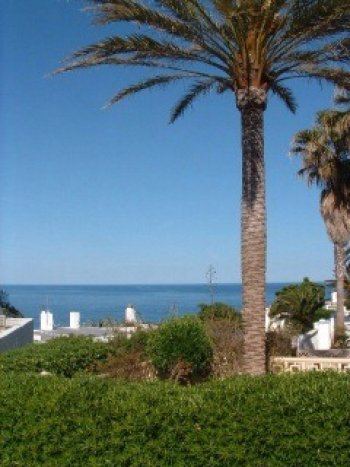 Planta baja con vistas al mar y jardÍn privado en complejo residen (2)